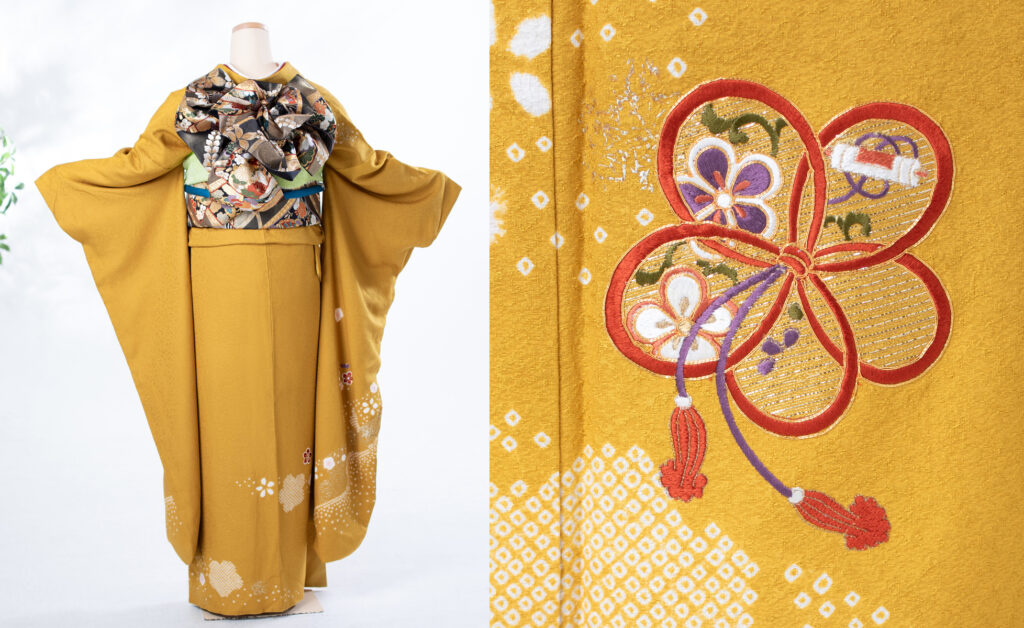 7.芥子色駒刺繍舞花文